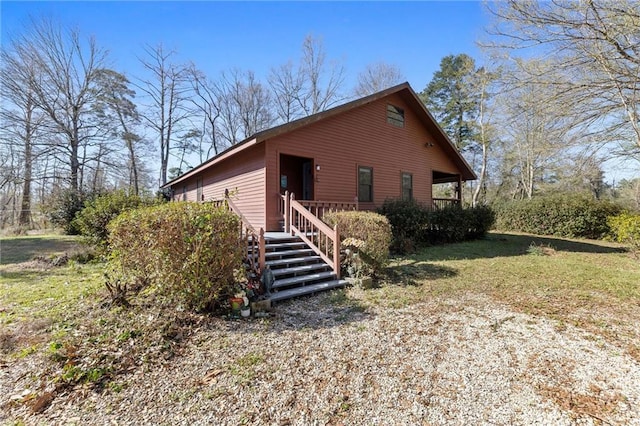 exterior space with a front yard