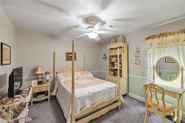 bedroom featuring visible vents, multiple windows, a ceiling fan, and carpet floors