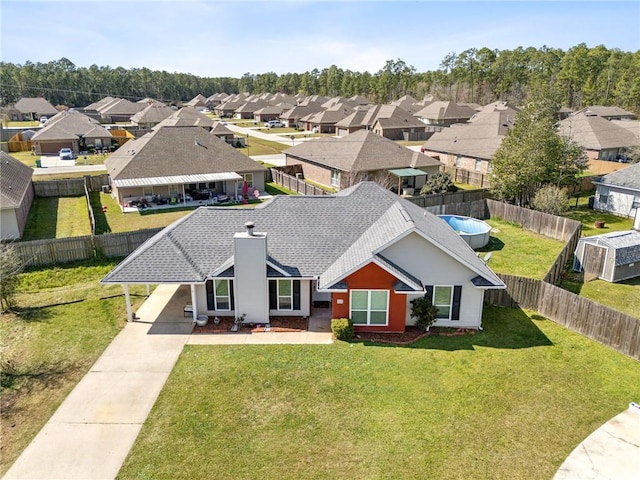 drone / aerial view with a residential view