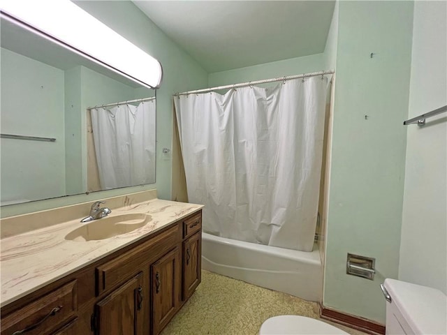 bathroom featuring shower / tub combo with curtain, toilet, and vanity