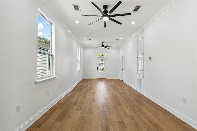 2764 Lavender St, New Orleans, LA 70122 - unfurnished room featuring a ceiling fan, wood finished floors, baseboards, recessed lighting, and crown molding