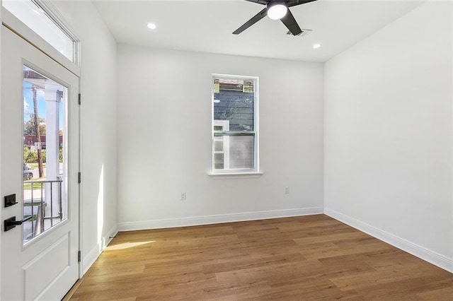 2764 Lavender St, New Orleans, LA 70122 - empty room with plenty of natural light, light wood-type flooring, baseboards, a ceiling fan, and recessed lighting