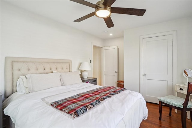 bedroom featuring ceiling fan and wood finished floors