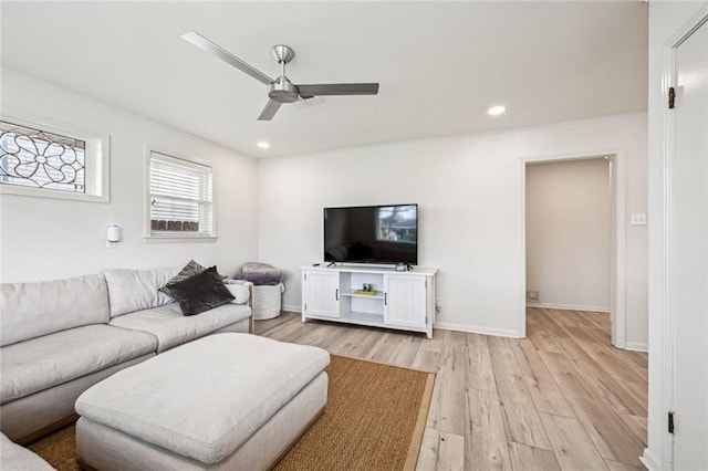 living room with recessed lighting, baseboards, light wood-type flooring, and a ceiling fan