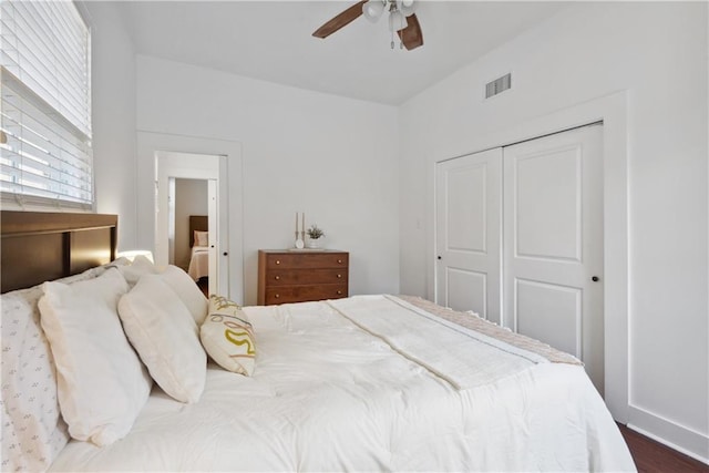 bedroom with visible vents, a closet, and a ceiling fan