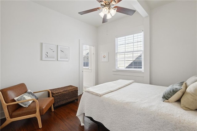 bedroom with a ceiling fan and wood finished floors