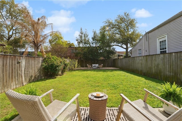 view of yard with a fenced backyard