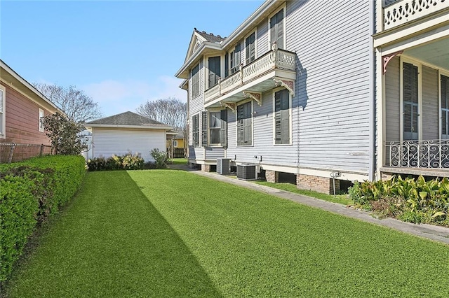 view of yard with central AC unit