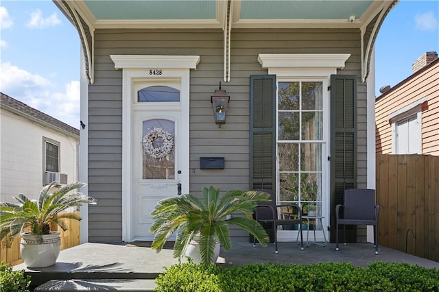 8428 Willow St, New Orleans, LA 70118 - property entrance with a porch