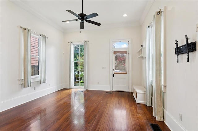 8428 Willow St, New Orleans, LA 70118 - foyer entrance with wood finished floors, ceiling fan, and crown molding