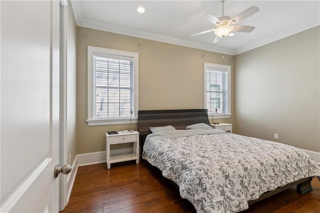 bedroom featuring baseboards, a ceiling fan, ornamental molding, and dark wood-style flooring