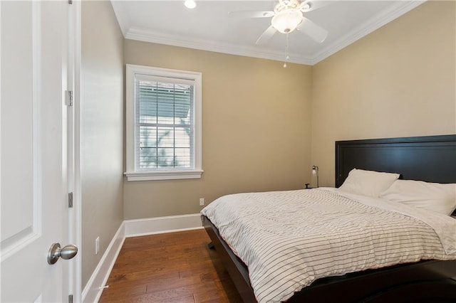 bedroom with ceiling fan, hardwood / wood-style flooring, baseboards, and ornamental molding