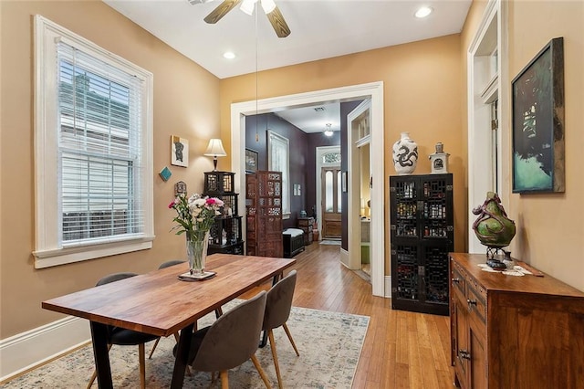 dining area featuring recessed lighting, ceiling fan, baseboards, and light wood-style floors