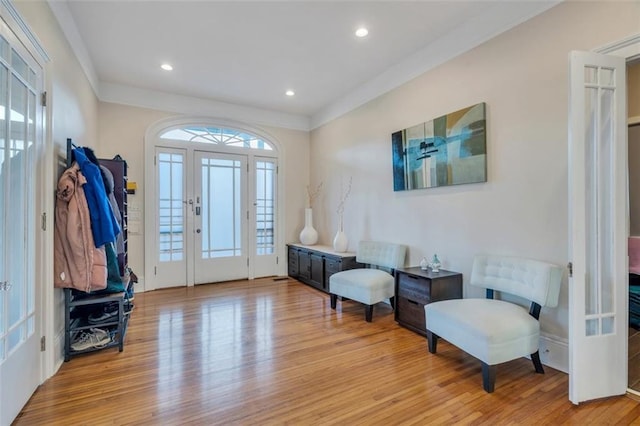 926 City Park Ave, New Orleans, LA 70119 - foyer entrance with crown molding, light wood-style flooring, and recessed lighting