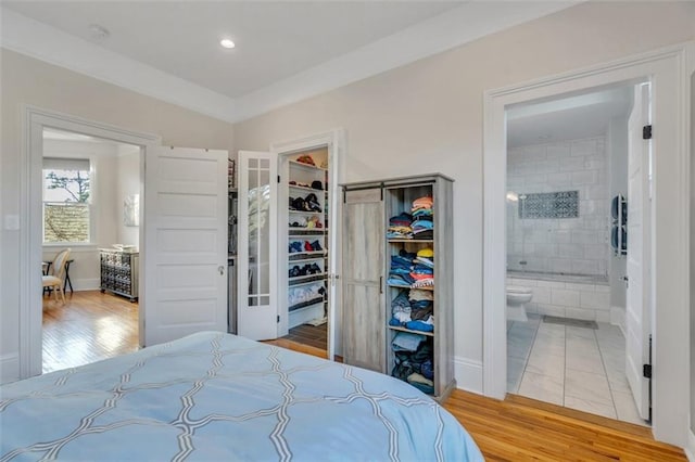 926 City Park Ave, New Orleans, LA 70119 - bedroom featuring recessed lighting, a closet, and wood finished floors