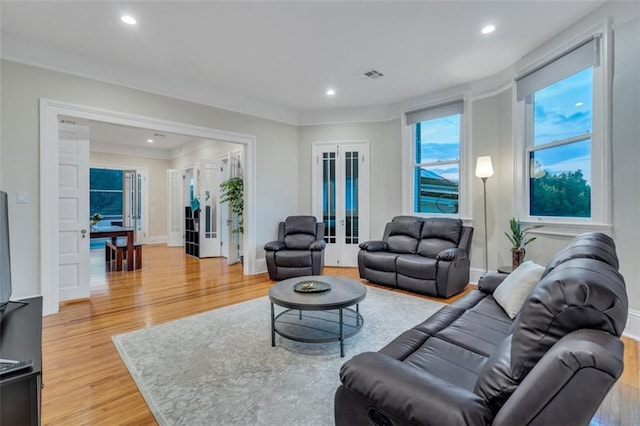 926 City Park Ave, New Orleans, LA 70119 - living room featuring visible vents, recessed lighting, french doors, and light wood-type flooring