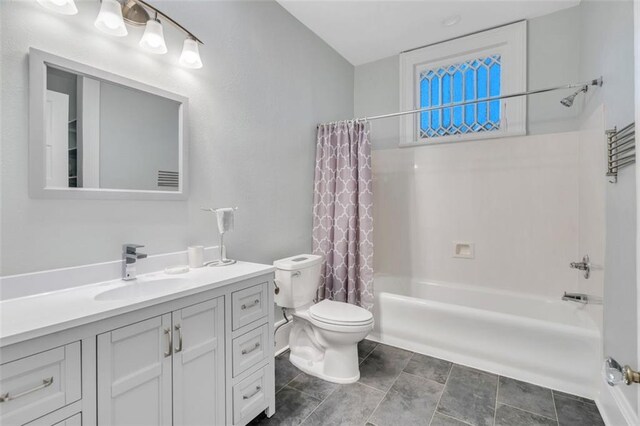 926 City Park Ave, New Orleans, LA 70119 - bathroom with vanity, shower / tub combo, and toilet