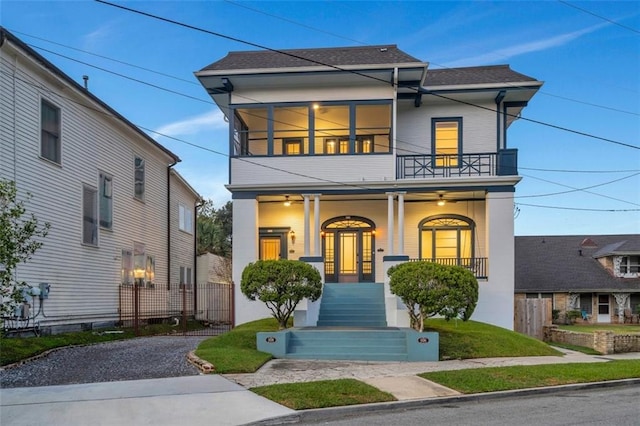 926 City Park Ave, New Orleans, LA 70119 - view of front of home with a porch, a shingled roof, and a balcony