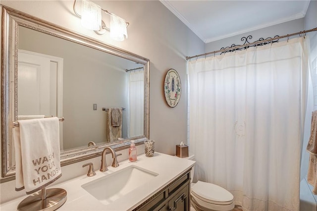 bathroom with a shower with shower curtain, vanity, toilet, and crown molding