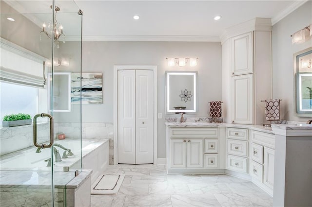 bathroom with a bath, marble finish floor, vanity, and ornamental molding