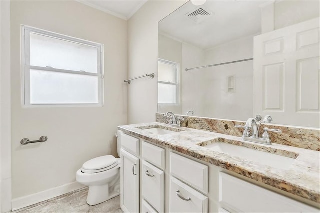 full bathroom featuring double vanity, toilet, visible vents, and a sink