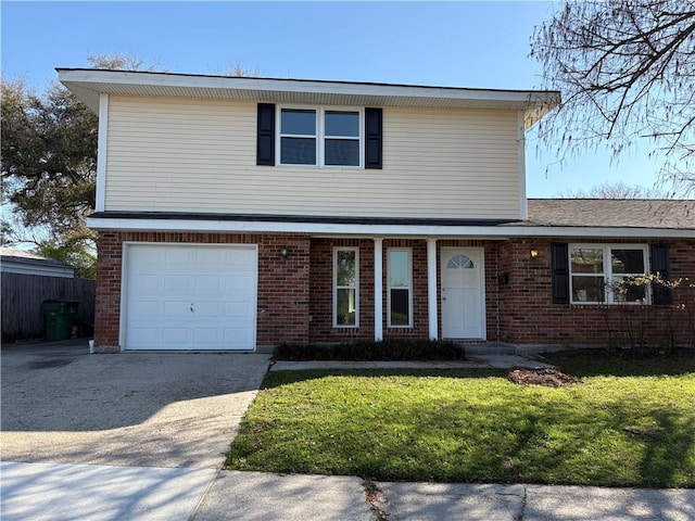 traditional-style home with brick siding, an attached garage, concrete driveway, and a front lawn