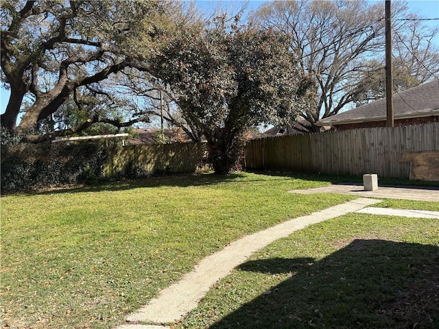 view of yard with fence