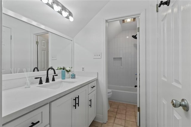 full bath with tile patterned floors, toilet, bathtub / shower combination, and vanity