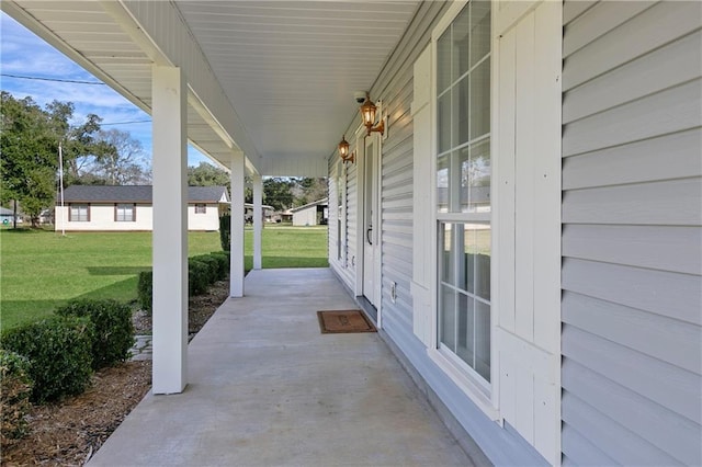 view of patio featuring a porch