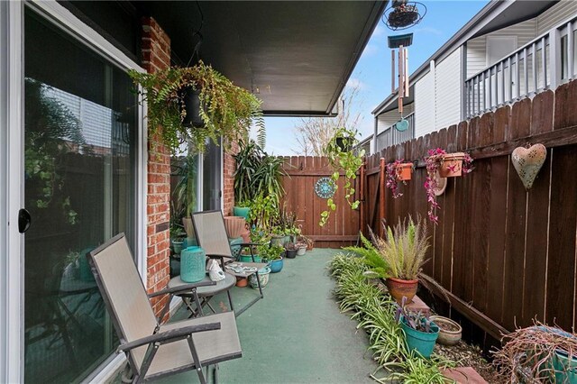 view of patio with fence