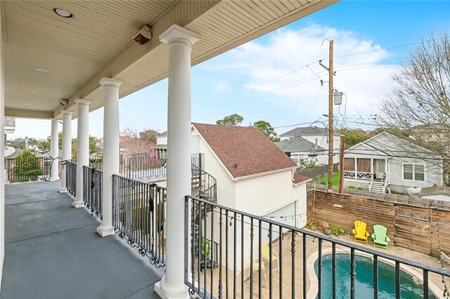 balcony featuring a residential view