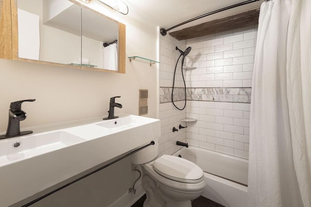 full bath featuring vanity, toilet, and shower / tub combo with curtain