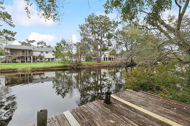 view of dock with a water view