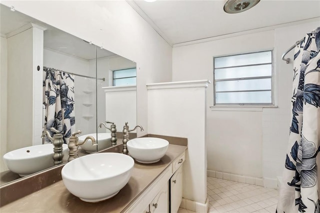 bathroom with a sink and curtained shower