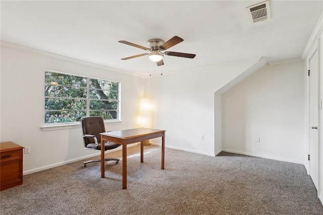 office space with visible vents, ornamental molding, carpet flooring, baseboards, and ceiling fan