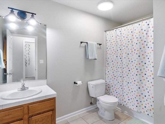 full bathroom featuring tile patterned flooring, a shower with curtain, toilet, and vanity