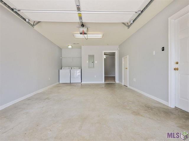 1500 Brightside Dr Unit D6, Baton Rouge, LA 70820 - garage with electric panel, a garage door opener, independent washer and dryer, and baseboards
