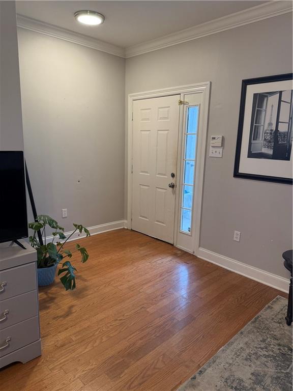 1500 Brightside Dr Unit D6, Baton Rouge, LA 70820 - foyer entrance featuring crown molding, wood finished floors, and baseboards