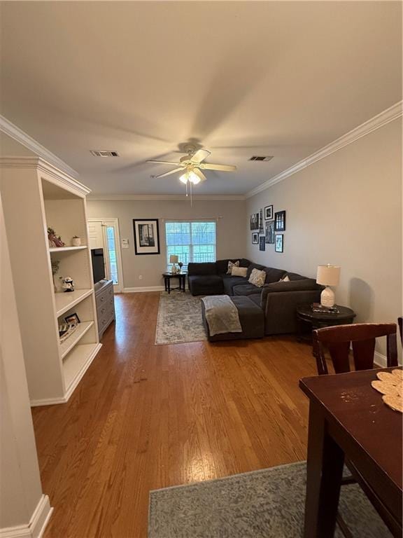 1500 Brightside Dr Unit D6, Baton Rouge, LA 70820 - living room with visible vents, ornamental molding, ceiling fan, and wood finished floors