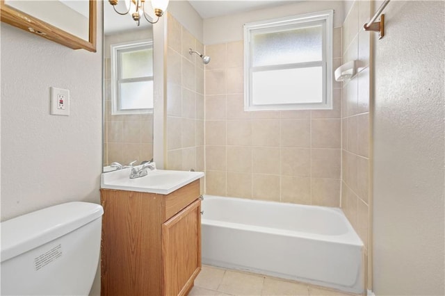 bathroom featuring vanity, tile patterned floors, toilet, shower / bathtub combination, and a chandelier