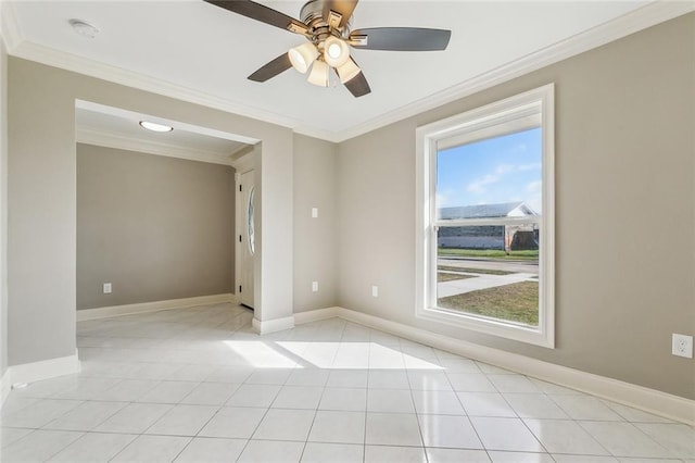 unfurnished room with baseboards and ornamental molding