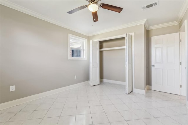 unfurnished bedroom with visible vents, crown molding, ceiling fan, baseboards, and light tile patterned floors