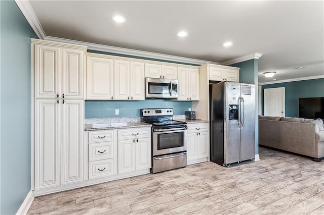 kitchen featuring open floor plan, appliances with stainless steel finishes, light wood-type flooring, and crown molding