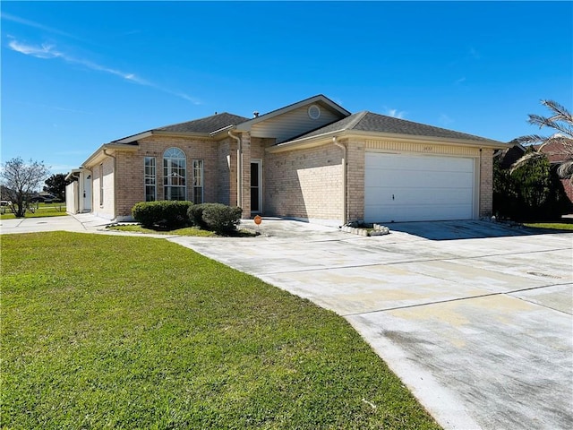 ranch-style house with driveway, an attached garage, a shingled roof, a front lawn, and brick siding