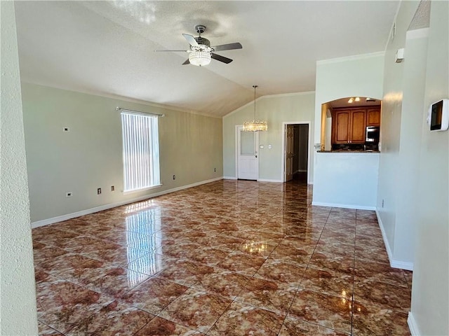 unfurnished living room with baseboards, lofted ceiling, ornamental molding, and ceiling fan with notable chandelier