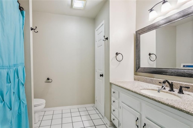 full bathroom featuring baseboards, toilet, vanity, and tile patterned flooring