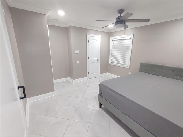 bedroom with light tile patterned floors, baseboards, and a ceiling fan