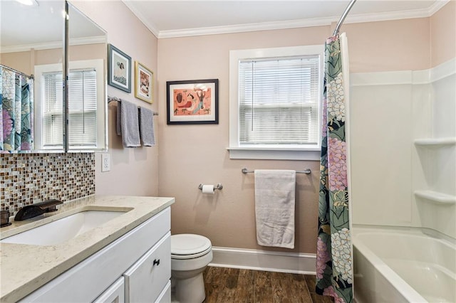 bathroom featuring a wealth of natural light, decorative backsplash, wood finished floors, and crown molding