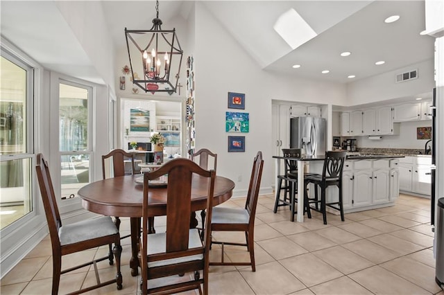 dining space with recessed lighting, visible vents, light tile patterned flooring, and a chandelier