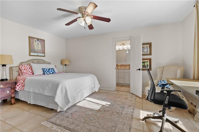 bedroom featuring ceiling fan, light tile patterned floors, and connected bathroom